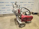 a small machine that is sitting on the ground