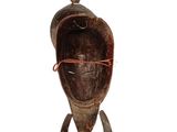 an image of a wooden sculpture of a man ' s head on a white background