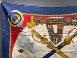 une image représentant un drapeau orné de deux épées et d'un bouclier
