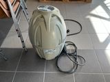 an image of a room with a heater on the floor