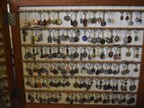 a display case with a lot of key chains on it