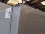 a refrigerator that has a sticker on the side of it