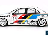 the car is white with blue, yellow, and red stripes