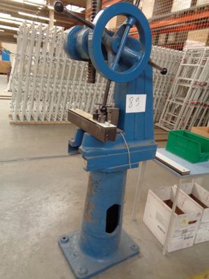 a machine that is sitting on the floor in a warehouse