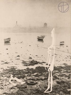 a black and white photo of a man standing on the beach