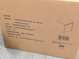 cardboard box on the ground next to a box with a barcode on it