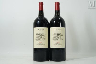 two bottles of wine sitting next to each other on a table