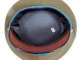 a brown hat with a blue band on top of it