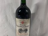 a close up of a bottle of wine on a white background