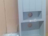 two shelves that are next to each other on the floor