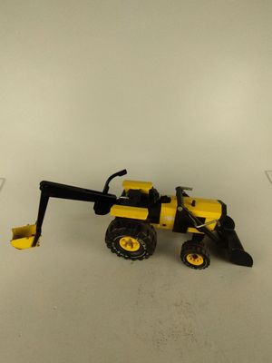 a toy tractor that is sitting on top of a table