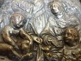 a close up of a statue of a woman and a child