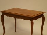 a small table with a wooden top on a white background