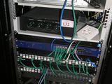 a rack with many different types of wires in it