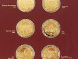 an image of a collection of coins in a display case