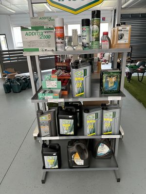 a stand with a lot of different products on it