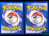 two pokemon cards with a picture of a red and white pokemon ball