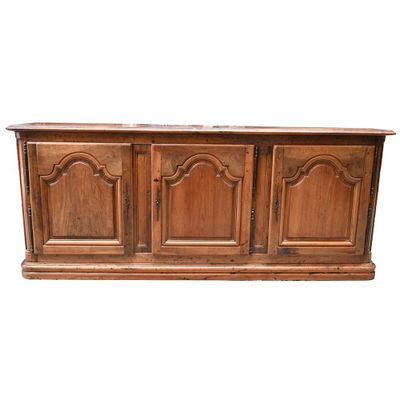 an old wooden sideboard with carvings and carvings on the top