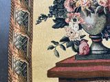 a picture of a picture of a vase of flowers on a table