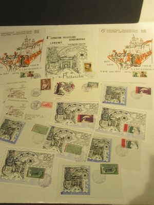 a picture of a table with a lot of stamps on it