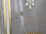 a close up of a table cloth with flowers on it