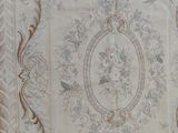a picture of a rug with a floral design on it