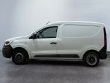 a picture of a white van parked in a room