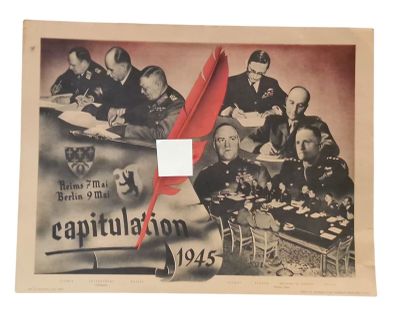 an old photo of a group of men sitting around a table with a red feather