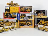 a lot of construction vehicles that are in boxes