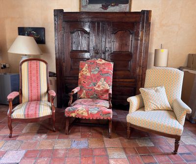 two chairs and a table in a living room