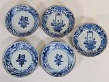 six blue and white plates with oriental designs on them