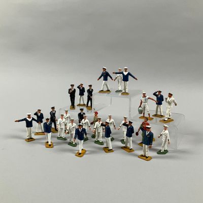 a lot of figurines that are on a table