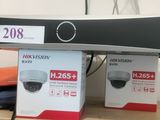two boxes that are sitting on a shelf next to each other