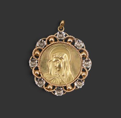 l'image d'une médaille d'or sur laquelle figure le visage d'une femme