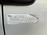 a sticker on the side of a white car