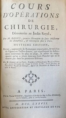 un livre avec un titre posé sur une table