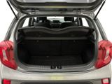 the back of a silver car with its trunk open