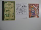 trois livres sont alignés sur un réfrigérateur et comportent des images