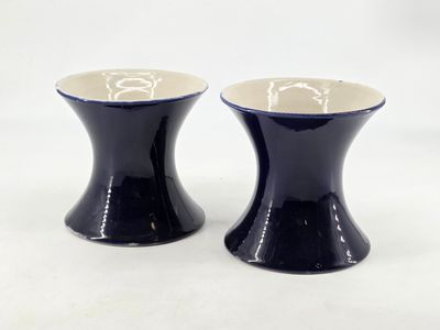 pair of black and white ceramic salt and pepper shakers
