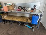 an image of a workbench with a lot of tools on it