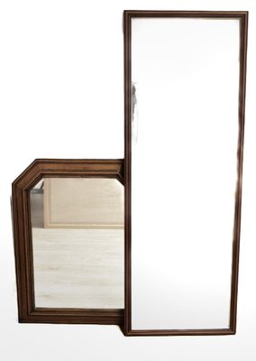 a mirror that is sitting on the floor in front of a mirror