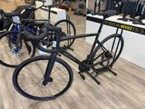 two bikes that are sitting on the floor in the store