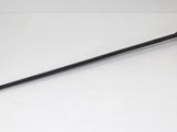 a sword that is laying on a white surface