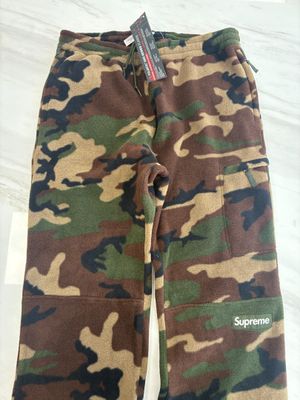 a close up of a pair of camouflage pants on a white surface
