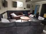 a living room with two couches and a coffee table