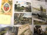 de nombreuses photos d'animaux et de personnes sur la table