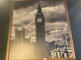 a picture of big ben on the wall of a restaurant
