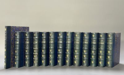a group of books sitting on top of each other on a table