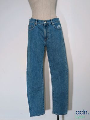 jeans on a mannequin stand on a white background