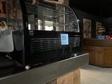 an image of a coffee machine in a coffee shop